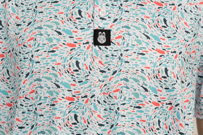 Close-up of button placket, showing structured neckline and subtle branding on the Fish 'n' Chips golf shirt.