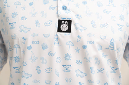 Close-up of beach-themed design on Fore-Shore Vibes golf polo showing palm print and high-quality finish