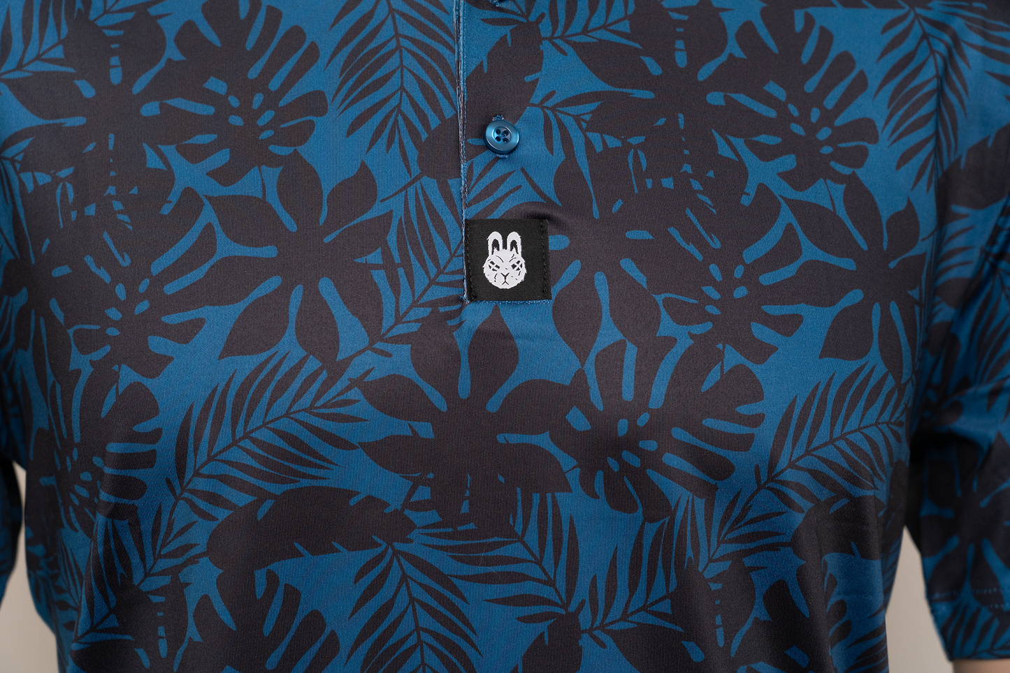 Close-up of the button placket of The Villages golf polo, designed with clean stitching and a polished look, perfect for both casual and sporty occasions.