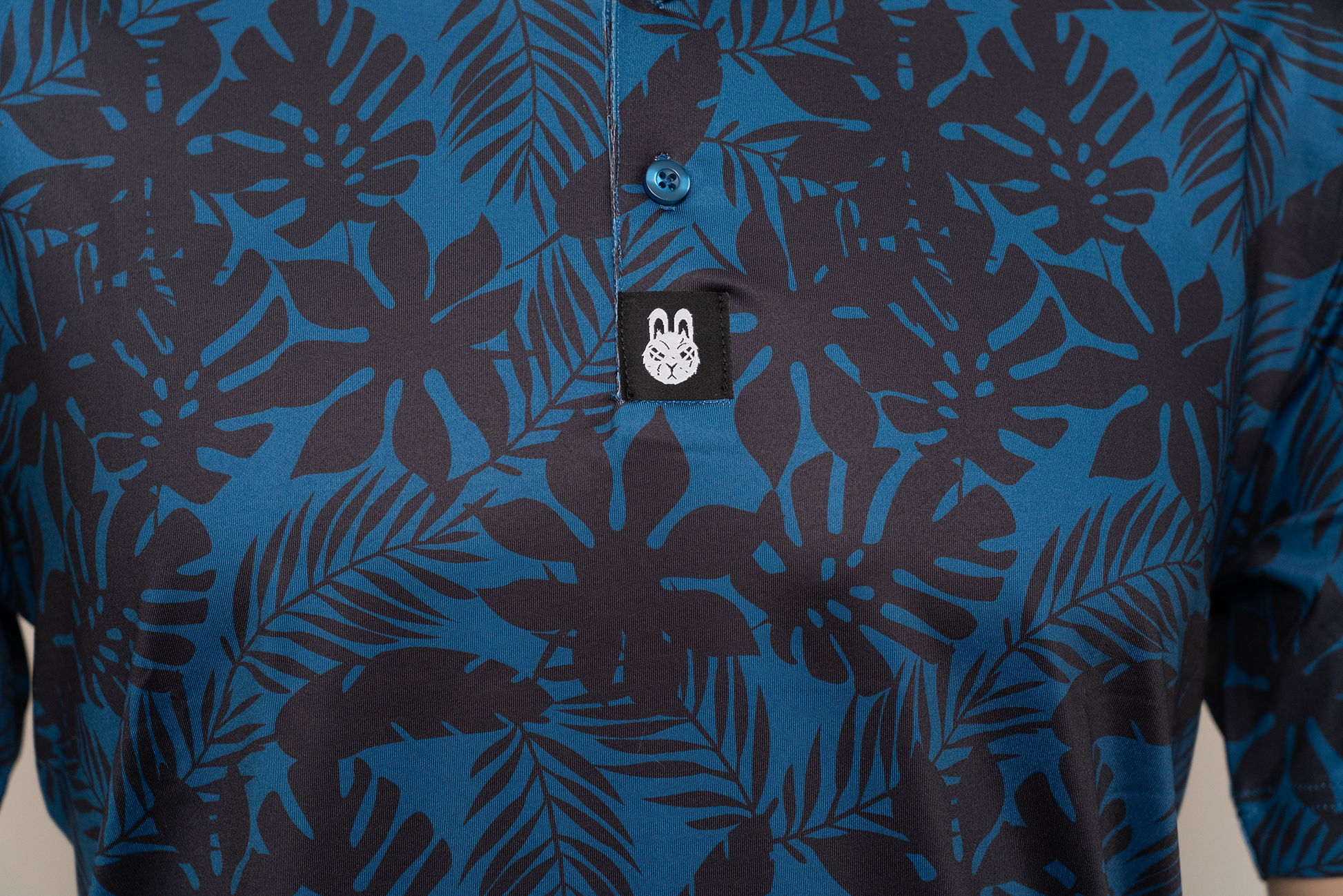 Close-up of the button placket of The Villages golf polo, designed with clean stitching and a polished look, perfect for both casual and sporty occasions.