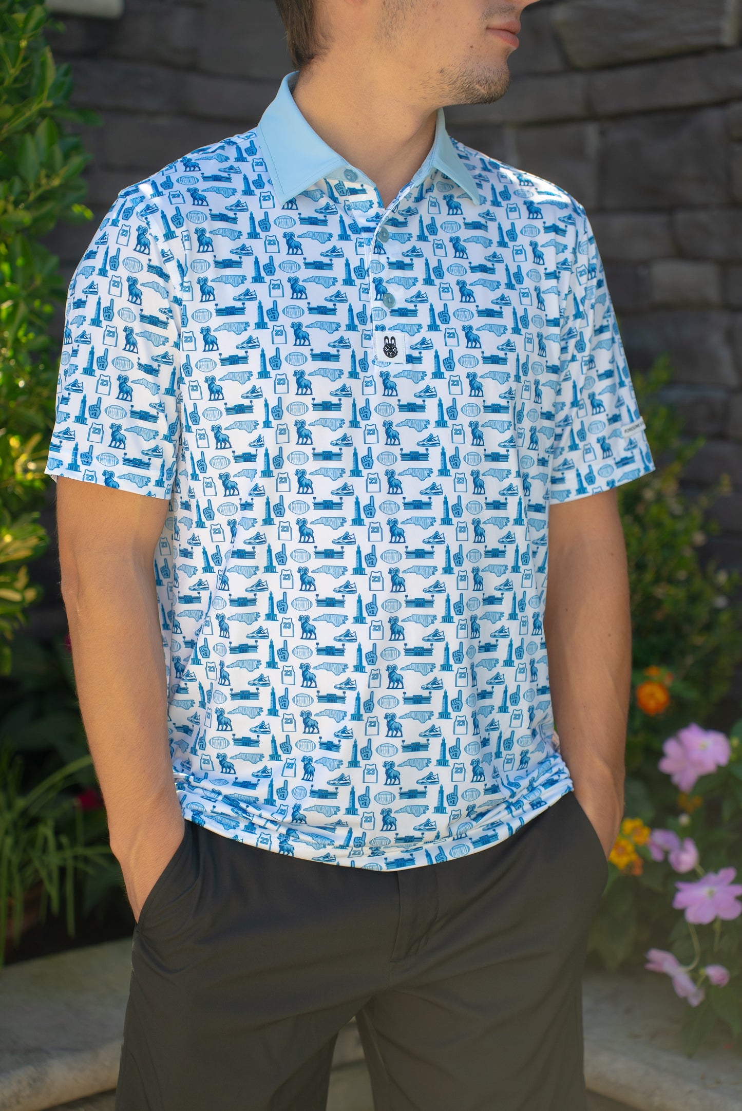 Front view of the Chapel Hill Hangtime UNC-inspired men’s golf polo by Foresome Golf Co.