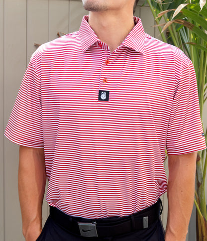 Man wearing The Ron Burgundy men’s golf polo tucked in for a polished golf style