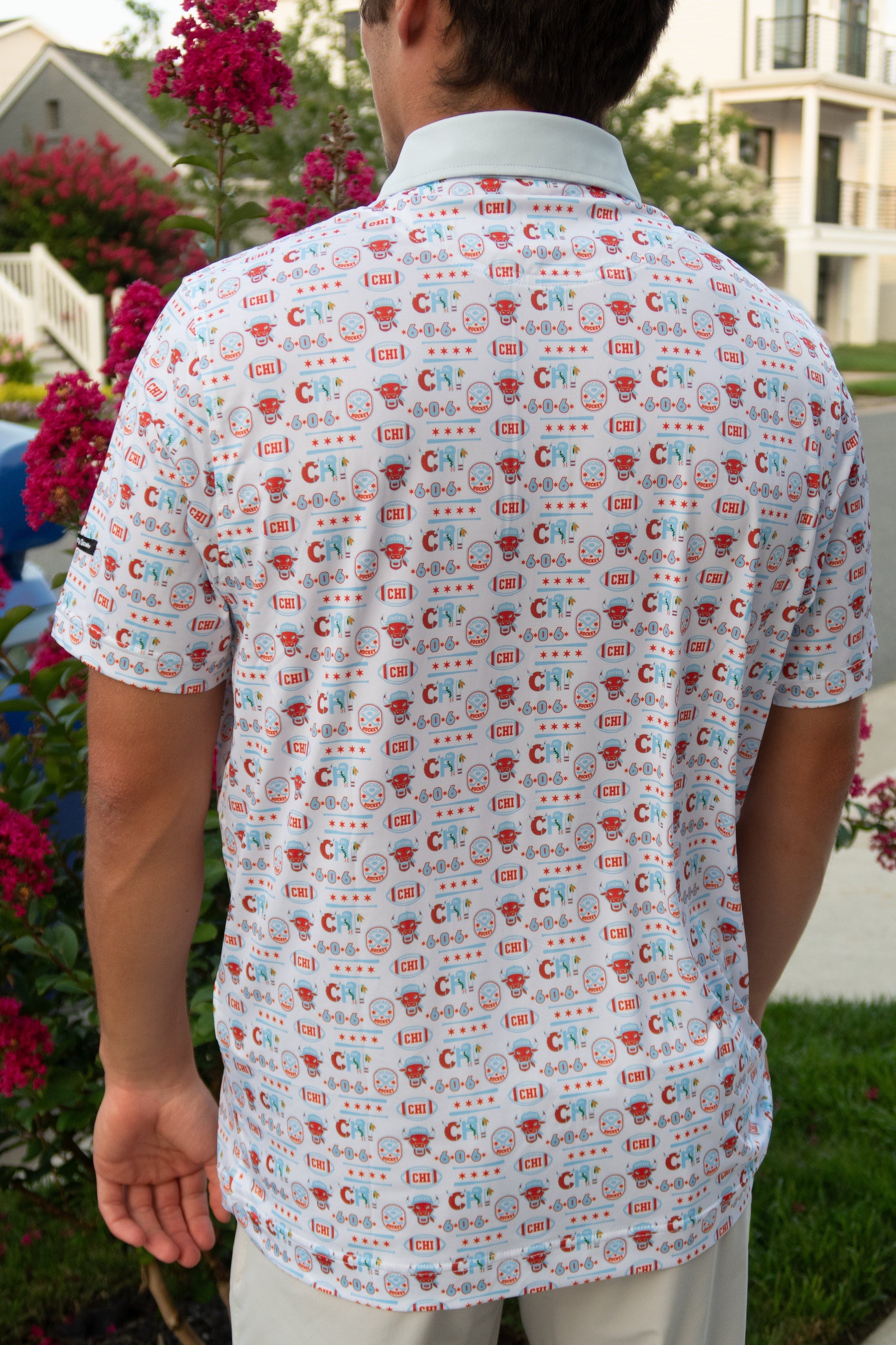 Back view of the Second City Swing Chicago inspired men’s golf polo by Foresome Golf Co. showing full design.