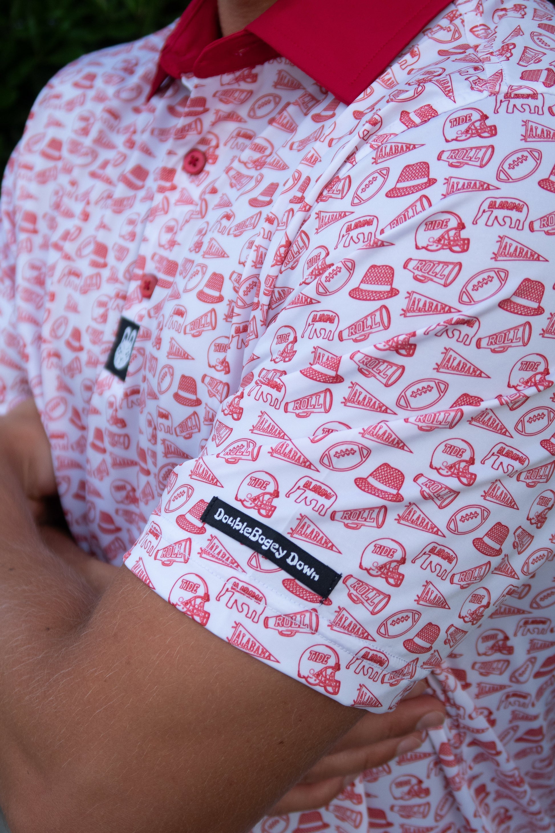 Side view of the Saturdays in Tuscaloosa Alabama men’s golf polo by Foresome Golf Co. showing fit and sleeve detail.