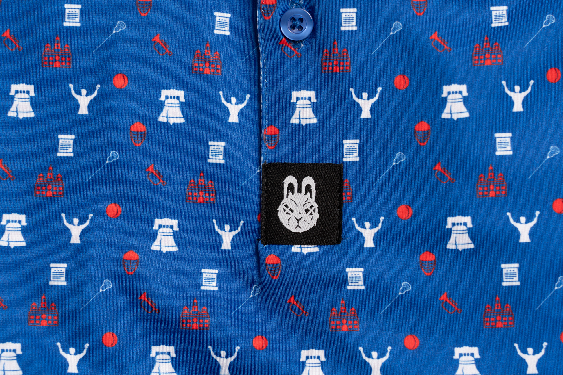 Close-up of The Philly Jawn Philly golf polo by Foresome Golf Co. showing fabric and stitching.